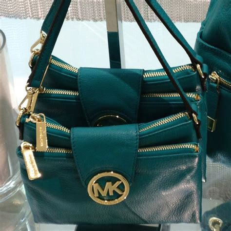 michael kors crossbody hombre|Michael Kors teal crossbody.